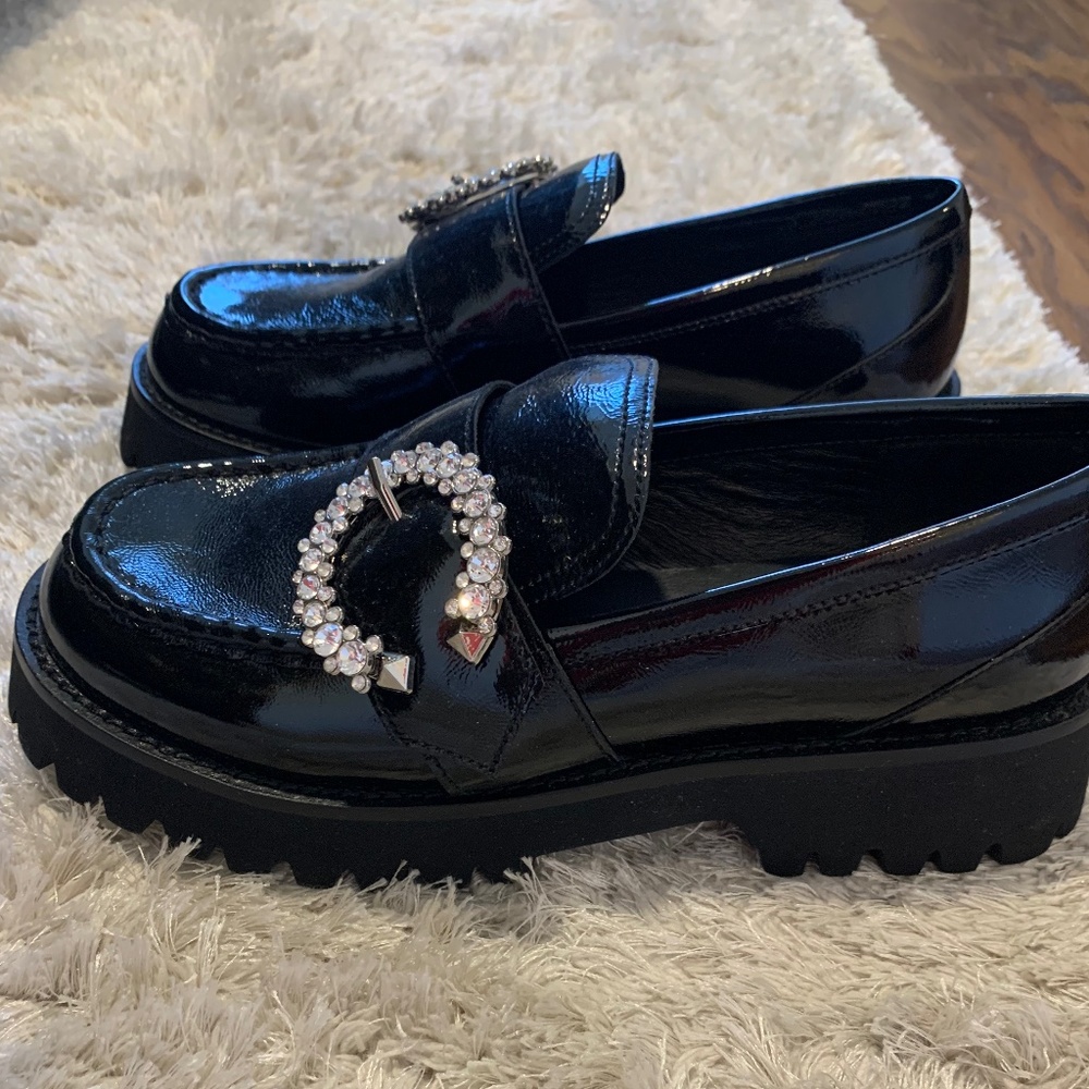 Black patent leather loafer